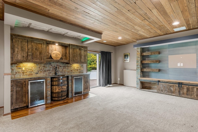6387 203rd Ct N, Forest Lake, MN 55025 - indoor dry bar with wine cooler, wood ceiling, carpet flooring, recessed lighting, and baseboards
