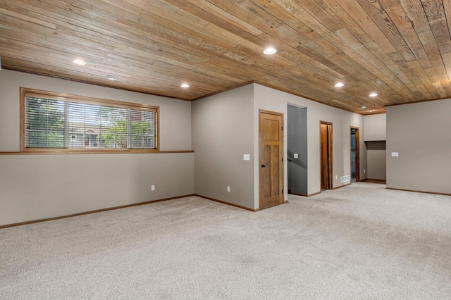 6387 203rd Ct N, Forest Lake, MN 55025 - spare room with wooden ceiling, light colored carpet, recessed lighting, and baseboards