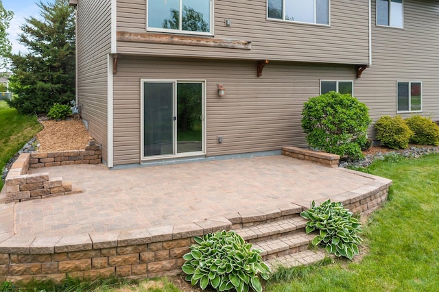 6387 203rd Ct N, Forest Lake, MN 55025 - back of house with a patio area