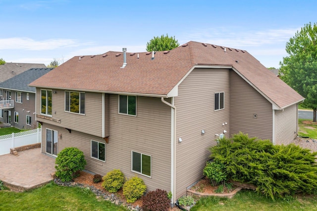 6387 203rd Ct N, Forest Lake, MN 55025 - rear view of property with a patio and roof with shingles