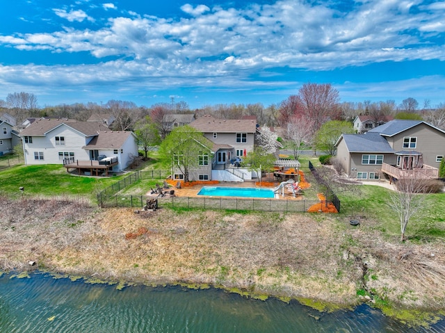 bird's eye view featuring a water view and a residential view