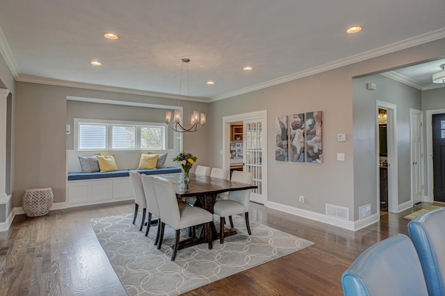 dining room featuring visible vents, an inviting chandelier, wood finished floors, baseboards, and recessed lighting