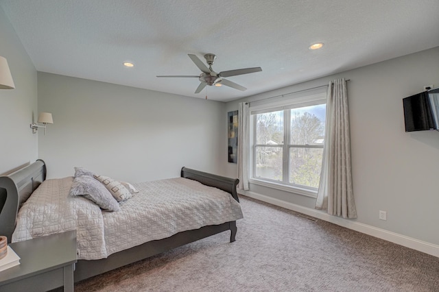 carpeted bedroom with visible vents, recessed lighting, baseboards, and ceiling fan