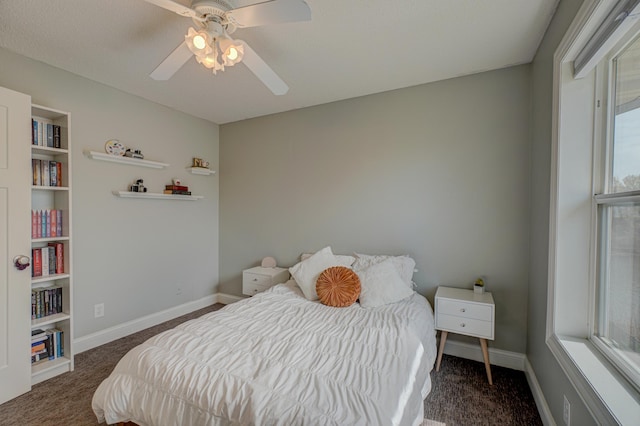 bedroom featuring baseboards, carpet, and ceiling fan