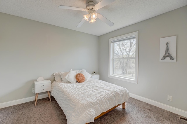 bedroom featuring carpet floors, baseboards, and visible vents