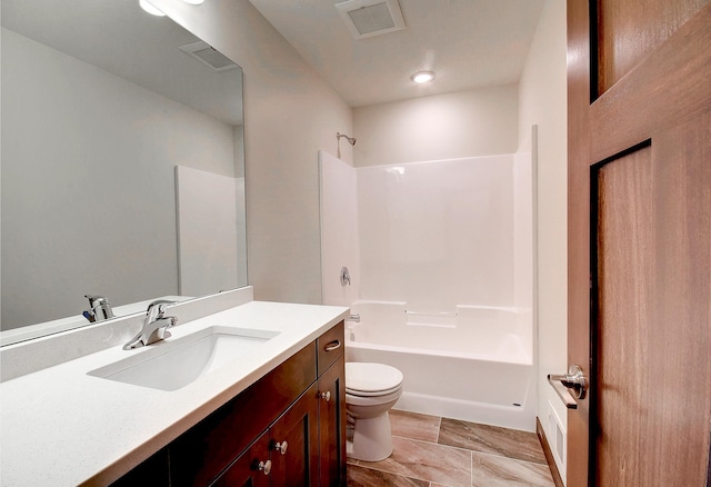bathroom featuring shower / bathing tub combination, visible vents, toilet, and vanity