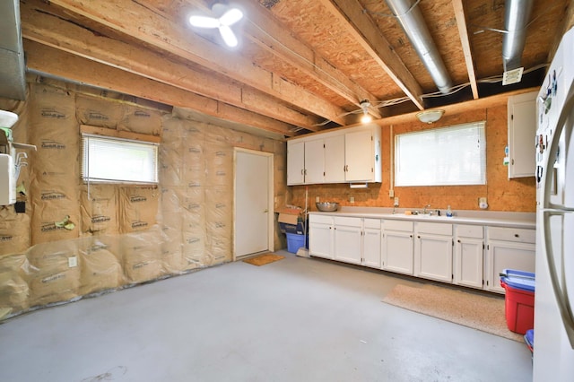 21682 Rebel Rd, Center Twp, MN 56465 - basement with freestanding refrigerator and a sink