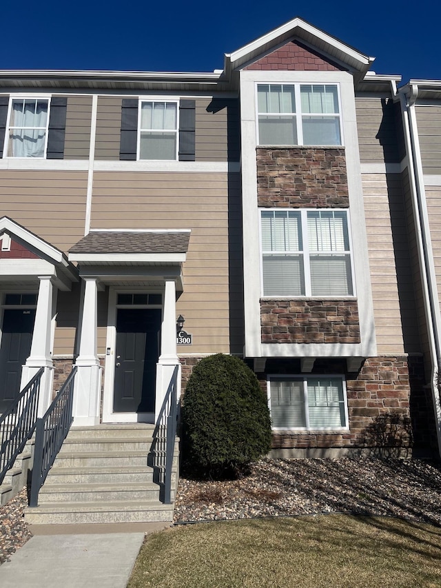 multi unit property with stone siding