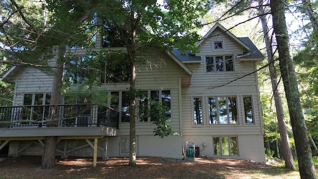 rear view of house with a deck