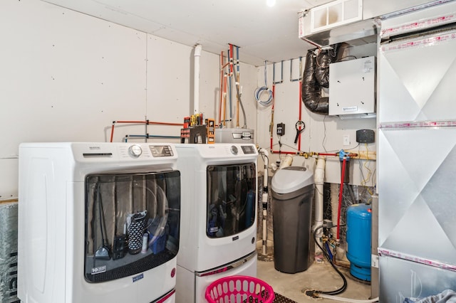 washroom with washer and dryer and laundry area