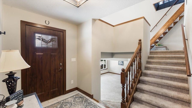 12468 Hermosa Beach Rd NW, Alexandria, MN 56308 - foyer entrance featuring stairway and baseboards