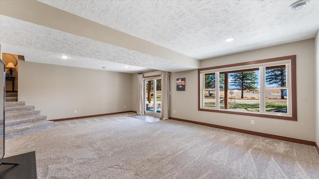 12468 Hermosa Beach Rd NW, Alexandria, MN 56308 - unfurnished living room featuring a textured ceiling, baseboards, carpet, recessed lighting, and stairway