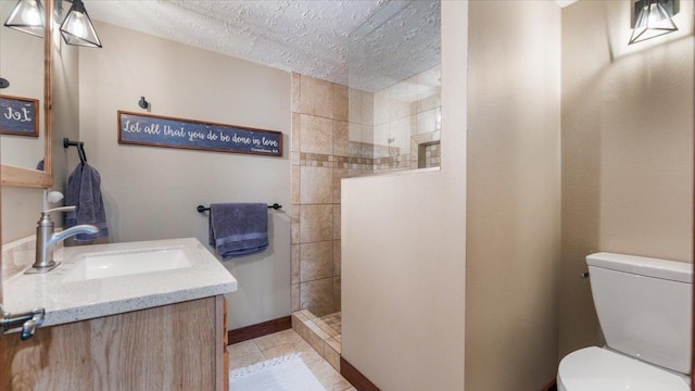 12468 Hermosa Beach Rd NW, Alexandria, MN 56308 - bathroom with walk in shower, vanity, toilet, a textured ceiling, and baseboards