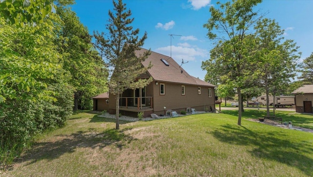 12468 Hermosa Beach Rd NW, Alexandria, MN 56308 - rear view of property featuring a lawn