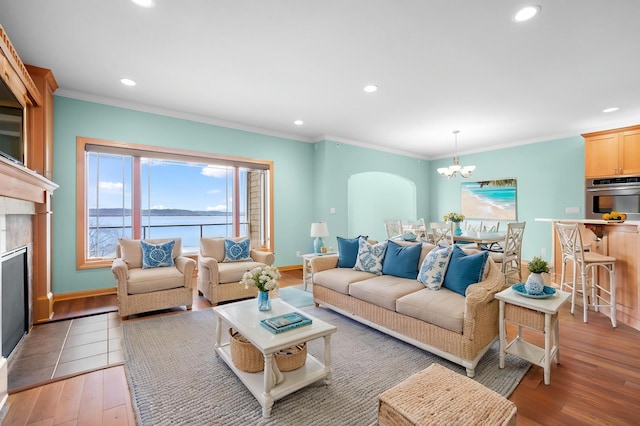 200 Michigan St Unit 1, Lake City, MN 55041 - living area with recessed lighting, light wood-style floors, and a chandelier