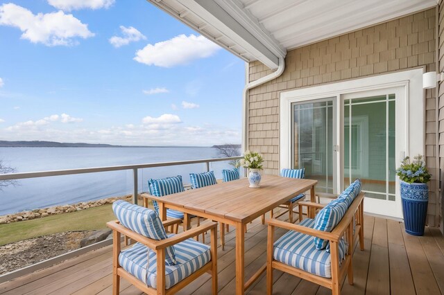 200 Michigan St Unit 1, Lake City, MN 55041 - balcony featuring outdoor dining area and a deck with water view