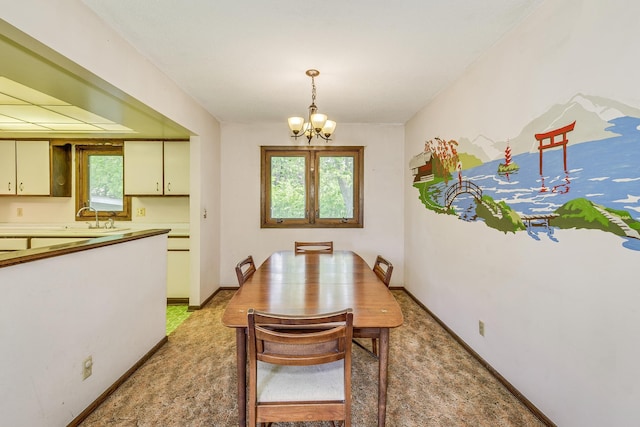 980 Carlton Dr, Shoreview, MN 55126 - dining area featuring a chandelier, plenty of natural light, baseboards, and light carpet