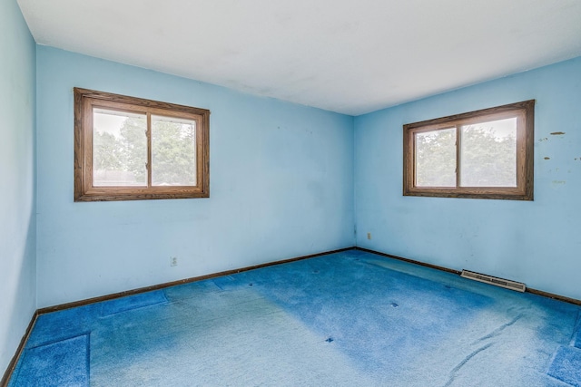 980 Carlton Dr, Shoreview, MN 55126 - carpeted empty room with baseboards