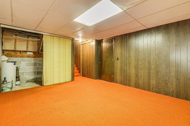 980 Carlton Dr, Shoreview, MN 55126 - finished below grade area featuring water heater, a drop ceiling, stairs, and wooden walls