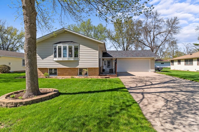 tri-level home with a garage, a front yard, and concrete driveway