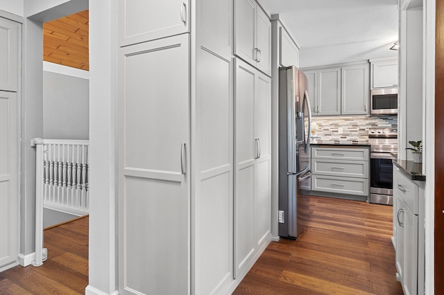 hallway featuring dark wood finished floors