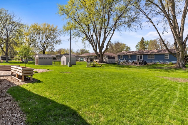 view of yard with a playground