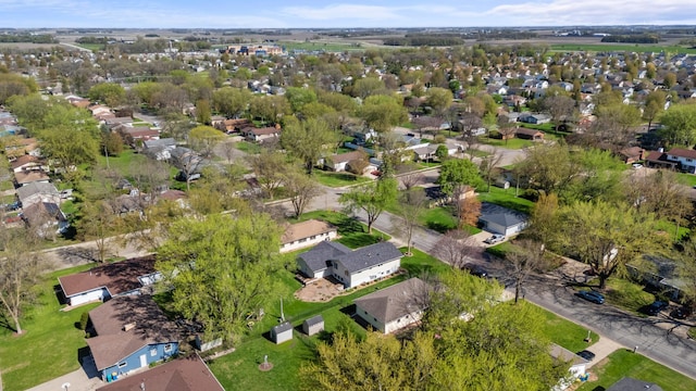 aerial view of property's location with nearby suburban area
