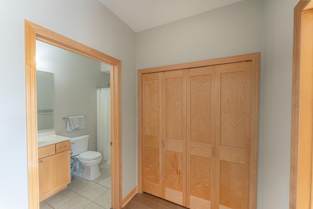 630 Main St N Unit 308, Stillwater, MN 55082 - bathroom featuring toilet, tile patterned floors, and vanity
