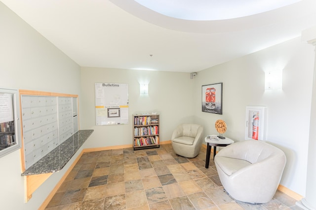 630 Main St N Unit 308, Stillwater, MN 55082 - sitting room with baseboards, stone finish flooring, and mail area
