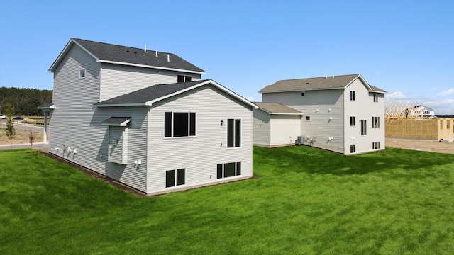 7510 170th Ave, Ramsey, MN 55303 - back of house featuring a yard and central air condition unit