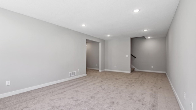 7510 170th Ave, Ramsey, MN 55303 - interior space with baseboards, recessed lighting, stairs, visible vents, and light colored carpet