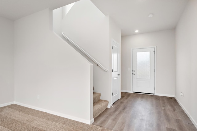 10080 Twin Lakes Pkwy NW, Elk River, MN 55330 - foyer entrance featuring stairs, wood finished floors, and recessed lighting