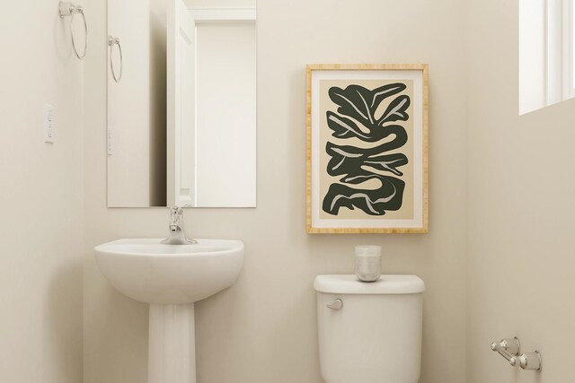 10080 Twin Lakes Pkwy NW, Elk River, MN 55330 - bathroom with toilet and a sink