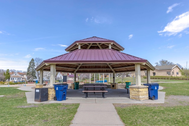 surrounding community featuring a gazebo and a yard
