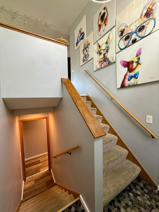 14303 Utica Ave, Savage, MN 55378 - stairs with wood finished floors and baseboards