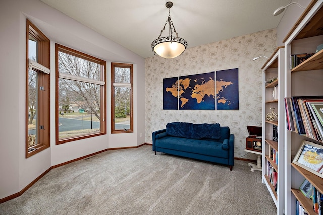 sitting room featuring baseboards, carpet flooring, and wallpapered walls