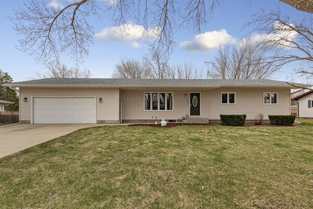 ranch-style house featuring an attached garage, a front yard, and concrete driveway