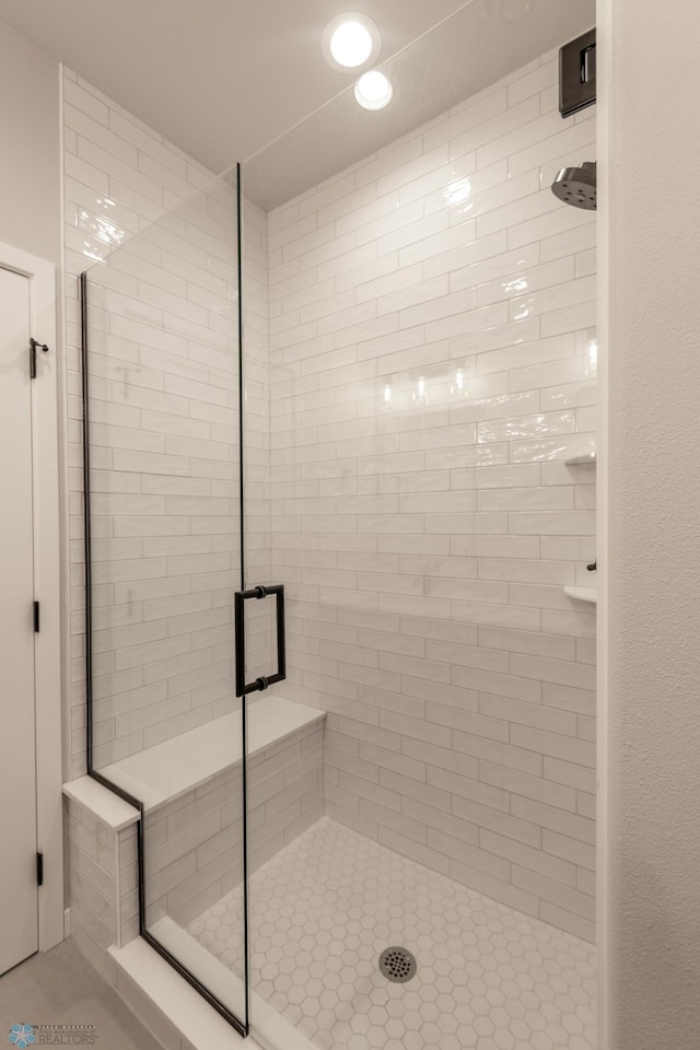 full bath with recessed lighting and a stall shower