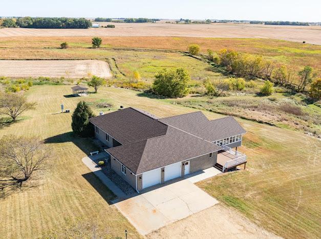birds eye view of property featuring a rural view