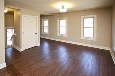 696 Hawthorne Ave E, Saint Paul, MN 55106 - empty room with baseboards and wood finished floors