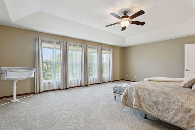 20413 Everton Trl N, Forest Lake, MN 55025 - bedroom with a tray ceiling, baseboards, a ceiling fan, and carpet floors