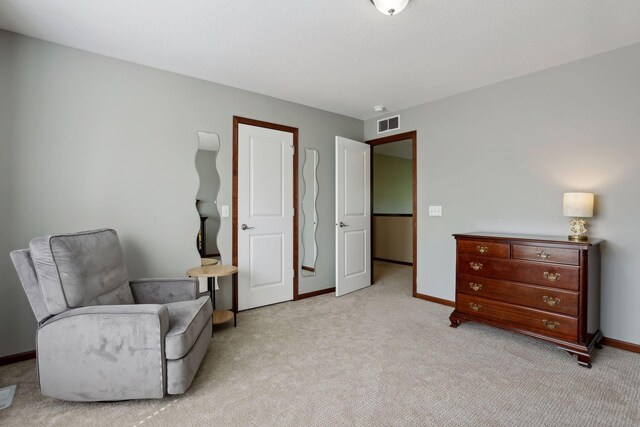 20413 Everton Trl N, Forest Lake, MN 55025 - sitting room featuring light carpet, baseboards, and visible vents