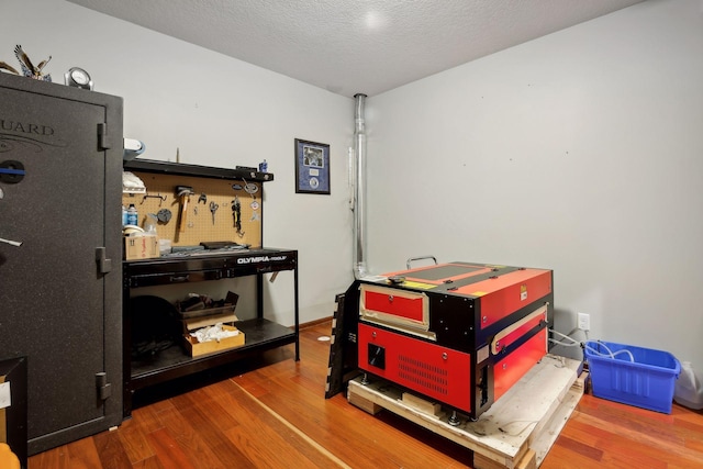 20413 Everton Trl N, Forest Lake, MN 55025 - miscellaneous room with wood finished floors and a textured ceiling