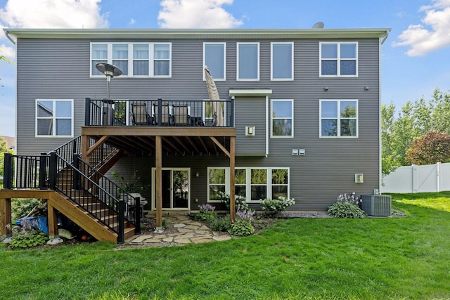 20413 Everton Trl N, Forest Lake, MN 55025 - back of property featuring a wooden deck, central AC, a lawn, stairway, and fence