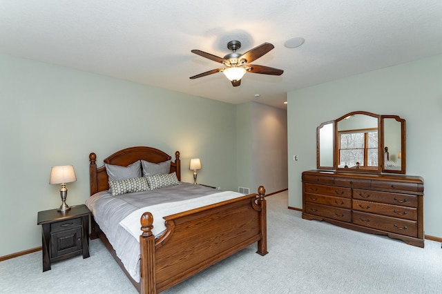 1125 Riverwood Dr SW, Oronoco, MN 55960 - bedroom with light colored carpet, baseboards, and ceiling fan