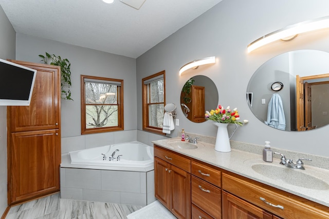 1125 Riverwood Dr SW, Oronoco, MN 55960 - full bathroom with double vanity and a bath