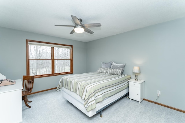 1125 Riverwood Dr SW, Oronoco, MN 55960 - bedroom featuring light colored carpet, baseboards, and ceiling fan