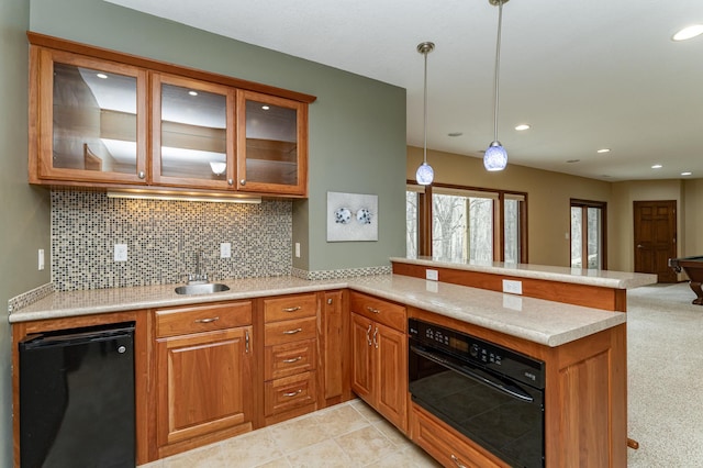 1125 Riverwood Dr SW, Oronoco, MN 55960 - kitchen with a peninsula, oven, light countertops, tasteful backsplash, and recessed lighting
