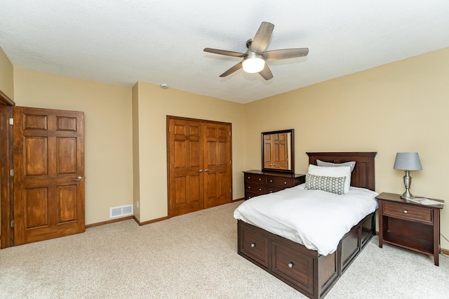 1125 Riverwood Dr SW, Oronoco, MN 55960 - bedroom featuring light carpet, a closet, baseboards, and ceiling fan