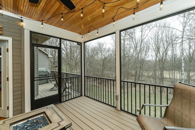 1125 Riverwood Dr SW, Oronoco, MN 55960 - sunroom / solarium featuring a ceiling fan and an outdoor fire pit